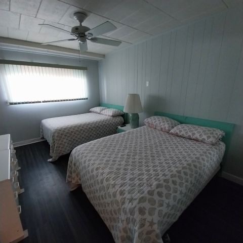 Bedroom with two full-size beds